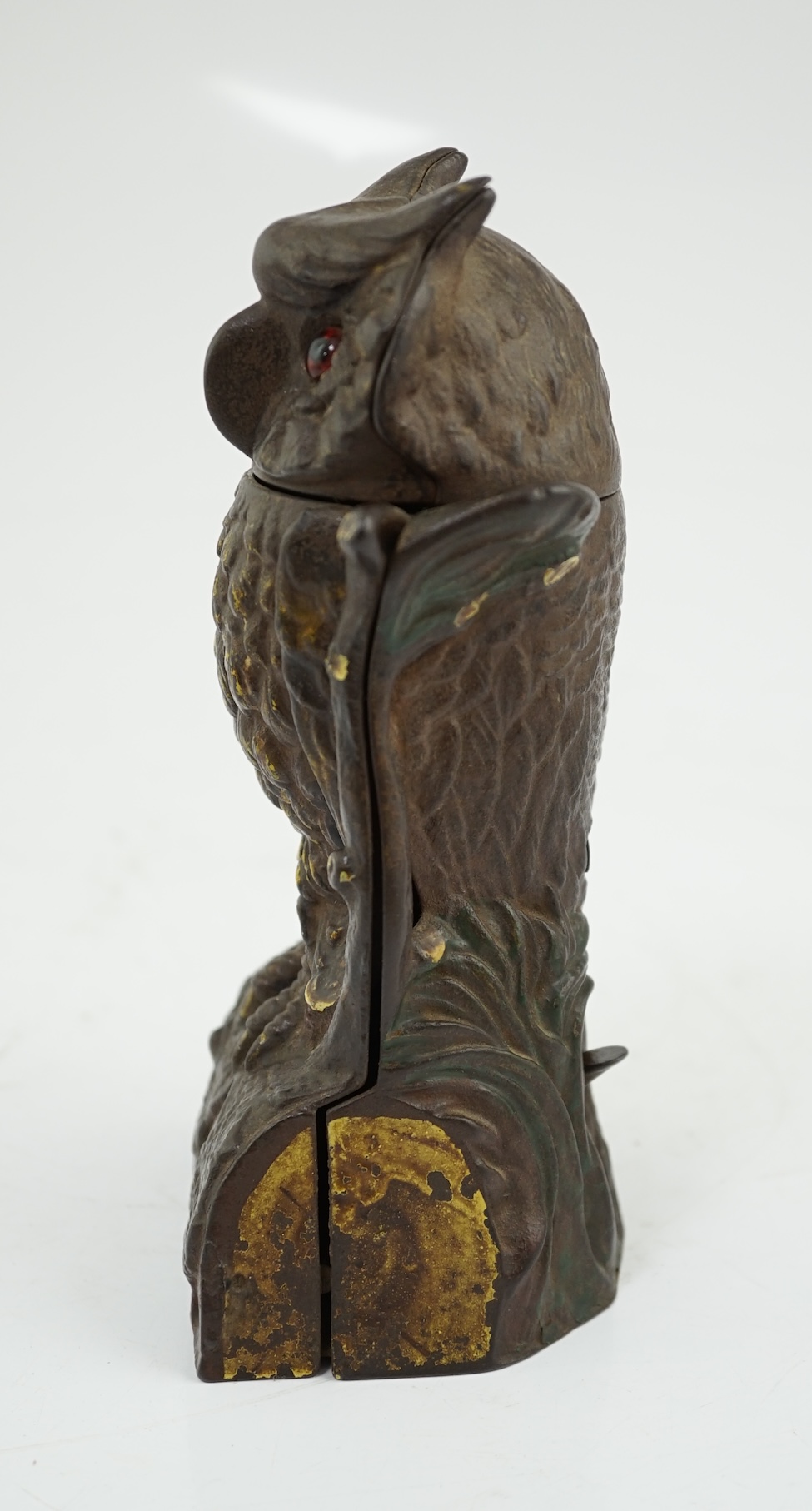 A late 19th century American cast iron owl Patent money box